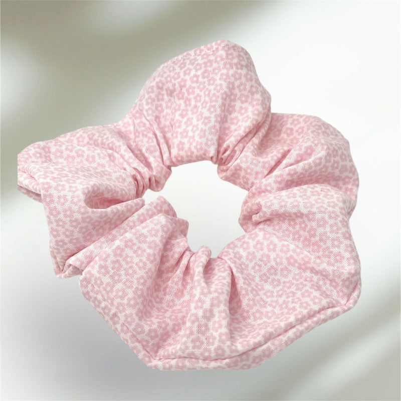 Coletero flores rosa